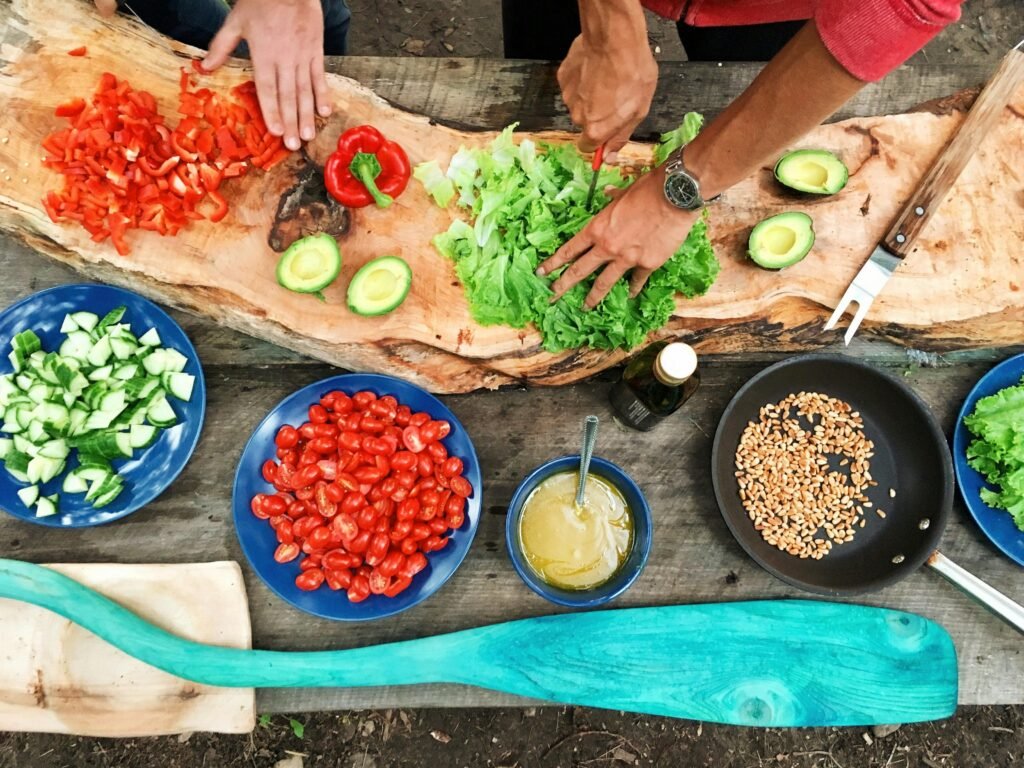 A collection of fresh vegetables and eco-friendly kitchen tools for sustainable cooking.